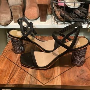 Black sandals with snake skin